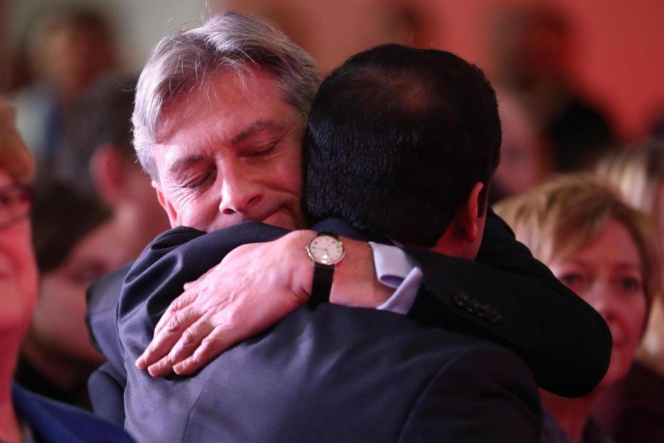 Richard Leonard is congratulated by Anas Sarwar at Glasgow Science Centre after he was announced as the new leader of Scottish Labour (PA)