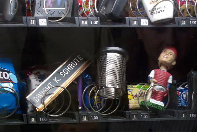 <p>NBC</p> Dwight Schrute's items placed in the vending machine on 'The Office'