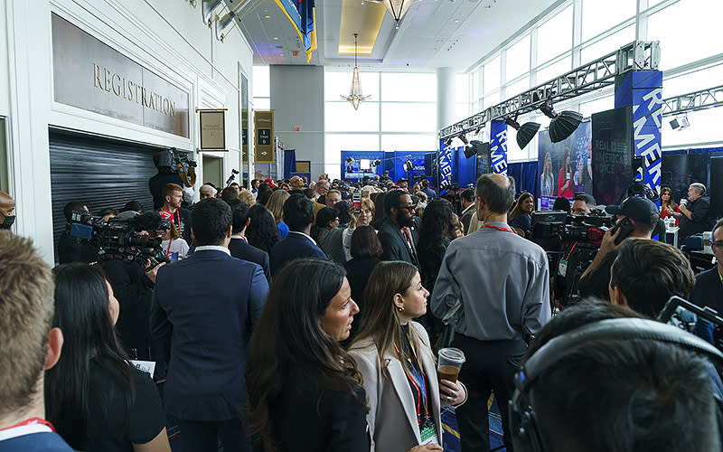 Attendees are seen near Radio Row during the Conservative Political Action Conference (CPAC) at the Gaylord National Resort and Convention Center in National Harbor, Md., on Thursday, March 2, 2023. <em>Greg Nash</em>