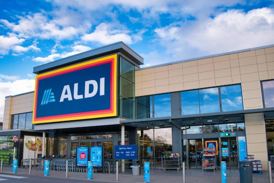 Aldi supermarket storefront under cloudy sky