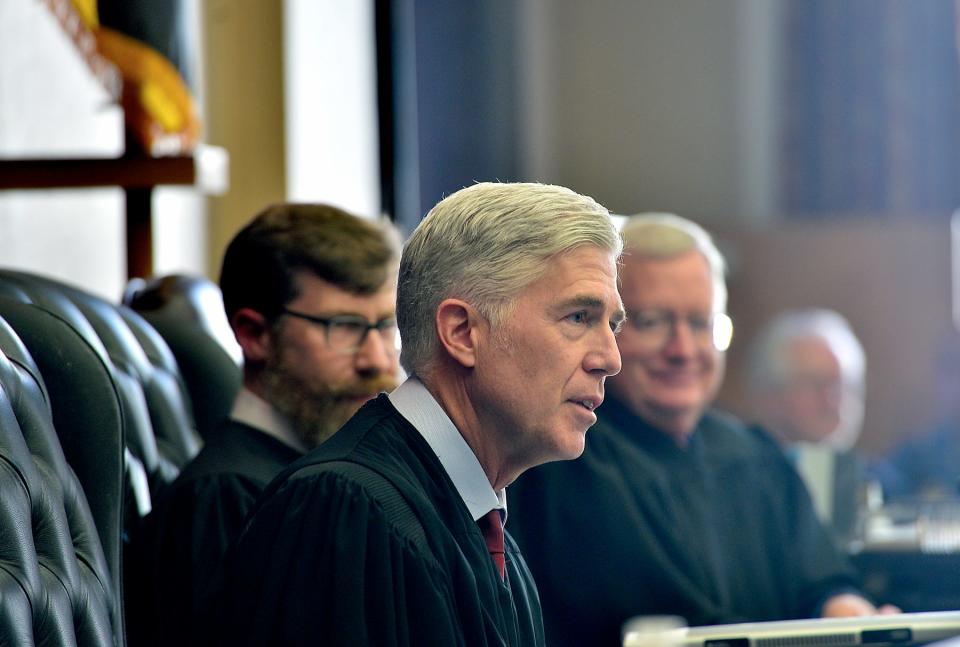 U.S. Supreme Court Justice Neil Gorsuch speaks during the investiture of  Joseph S. Michael as associate judge of the Circuit Court of Washington County during a ceremony Friday in the old courthouse in Hagerstown.