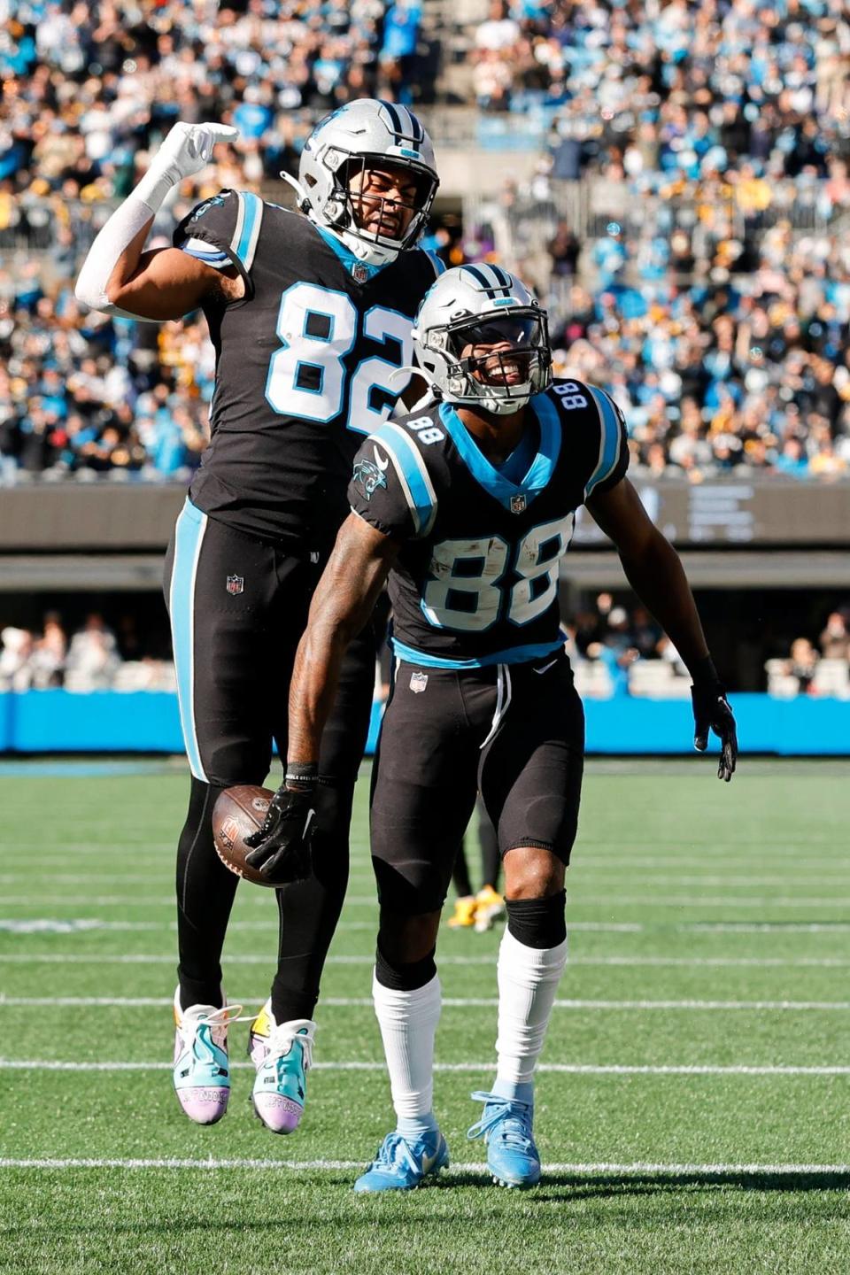 Carolina Panthers tight end Tommy Tremble (82) and Carolina Panthers wide receiver Terrace Marshall Jr. (88) celebrate during a game against the Pittsburgh Steelers at Bank of America Stadium in Charlotte, N.C., Sunday, Dec. 18, 2022.