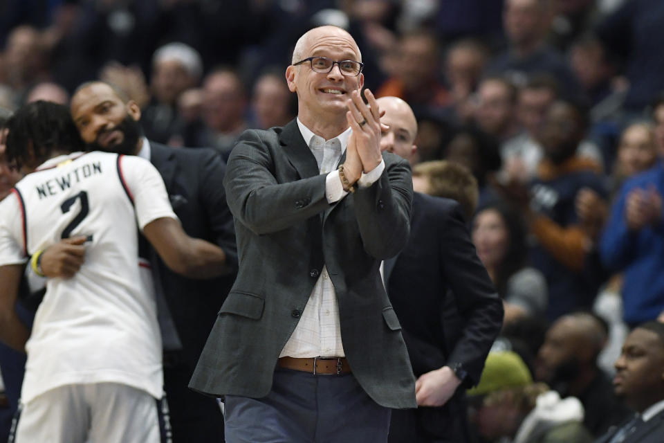 UConn head coach Dan Hurley claps in the second half of an NCAA college basketball game against Marquette, Saturday, Feb. 17, 2024, in Hartford, Conn. (AP Photo/Jessica Hill)