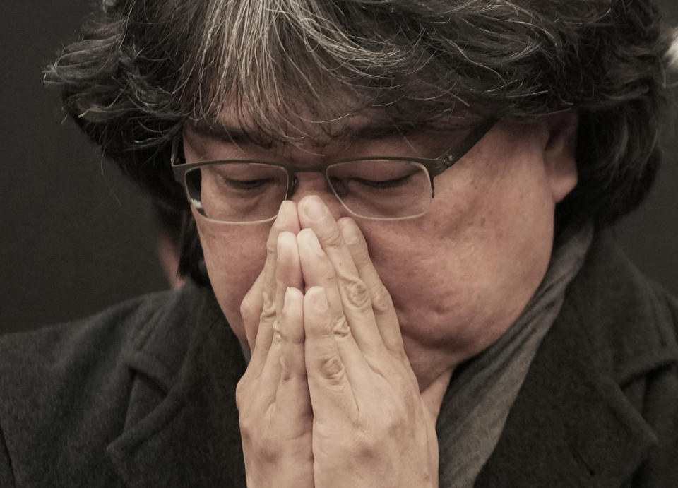 South Korean director Bong Joon-ho reacts during a press conference demanding an investigation into the case for the death of the late actor Lee Sun-kyun in Seoul, South Korea, Friday, Jan. 12, 2024. Lee, a popular South Korean actor best known for his role in the Oscar-winning movie "Parasite," was found dead in a car in Seoul on Dec. 27, 2023, authorities said, after weeks of an intense police investigation into his alleged drug use. (AP Photo/Ahn Young-joon)