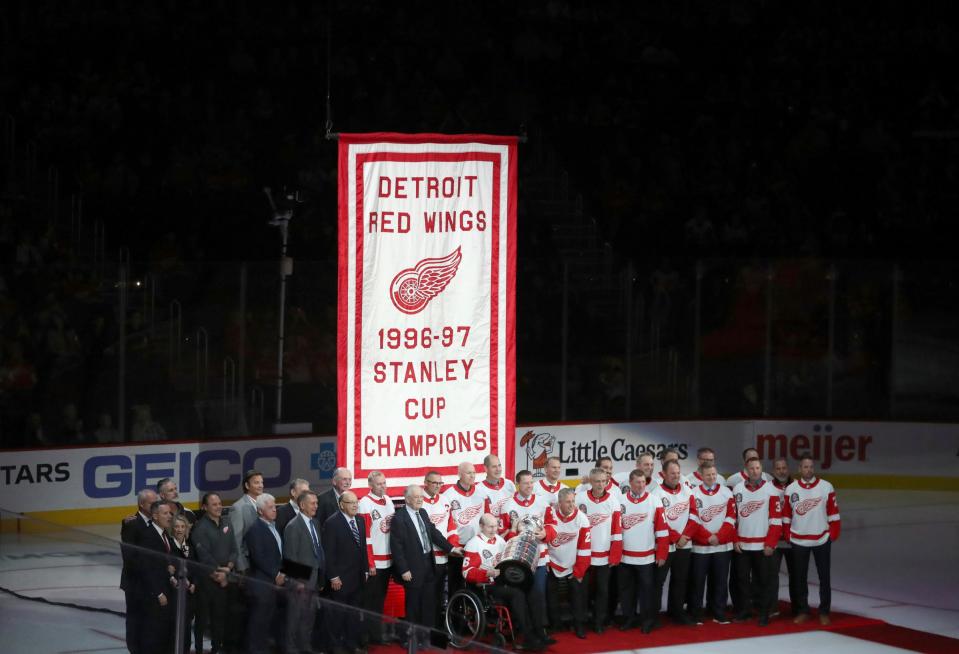 The Red Wings raise the 1996-97 championship banner during a ceremony honoring the 25th anniversary of the win over the Flyers in the Stanley Cup finals on Thursday, Nov. 3, 2022, at Little Caesars Arena.