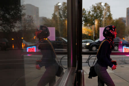 U.S. Democratic congressional candidate Ilhan Omar arrives to "door knock" to encourage voters to cast ballots in the midterm elections in Minneapolis, Minnesota, U.S., October 26, 2018. Picture taken October 26, 2018. REUTERS/Brian Snyder