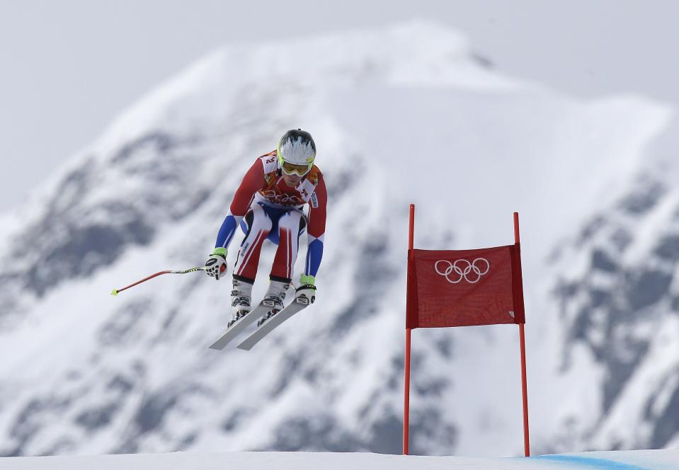 France's Alexis Pinturault makes a jump during Men's super combined downhill training at the Sochi 2014 Winter Olympics, Tuesday, Feb. 11, 2014, in Krasnaya Polyana, Russia. (AP Photo/Luca Bruno)