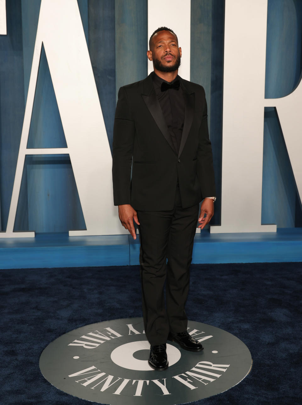 Marlon Wayans in Black suit