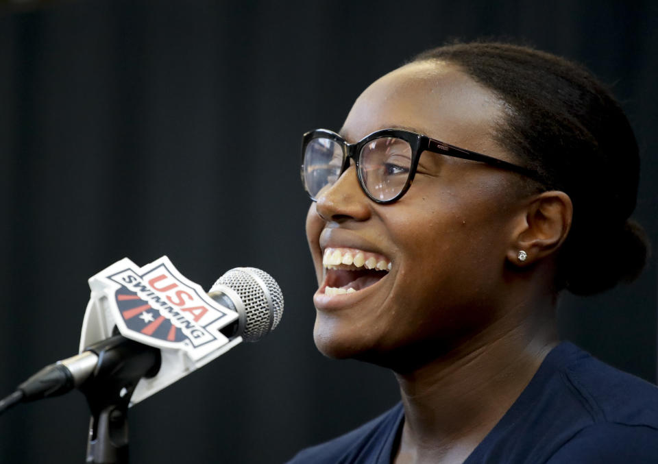 Simone Manuel laughs during a news conference for the Phillips 66 National Championship Swimming meet Tuesday, July 24, 2018, in Irvine, Calif. The meet starts Wednesday. (AP Photo/Chris Carlson)