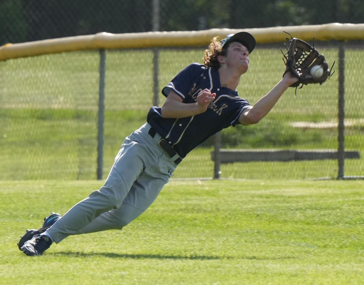 Emerson, NJ -- May 8, 2024 -- Thomas Ingallinera makes a catch in right field for Hackensack as Hackensack visited Emerson in the Bergen County baseball tournament Round of 16.