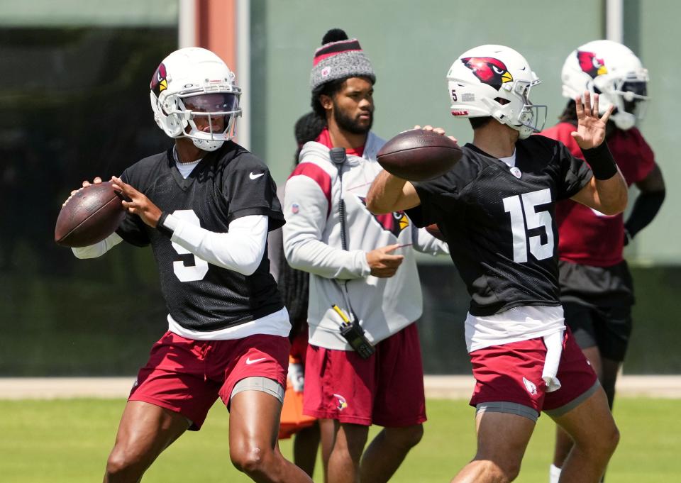 Arizona Cardinals Kyler Murray watches quarterbacks Joshua Dobbs (9) and Clayton Tune (15) during practice at Cardinals Dignity Health training facility in Tempe on Aug. 30, 2023.