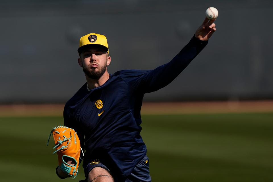 Brewers pitcher DL Hall throws a pitch during spring training workouts in Phoenix on Feb. 15.