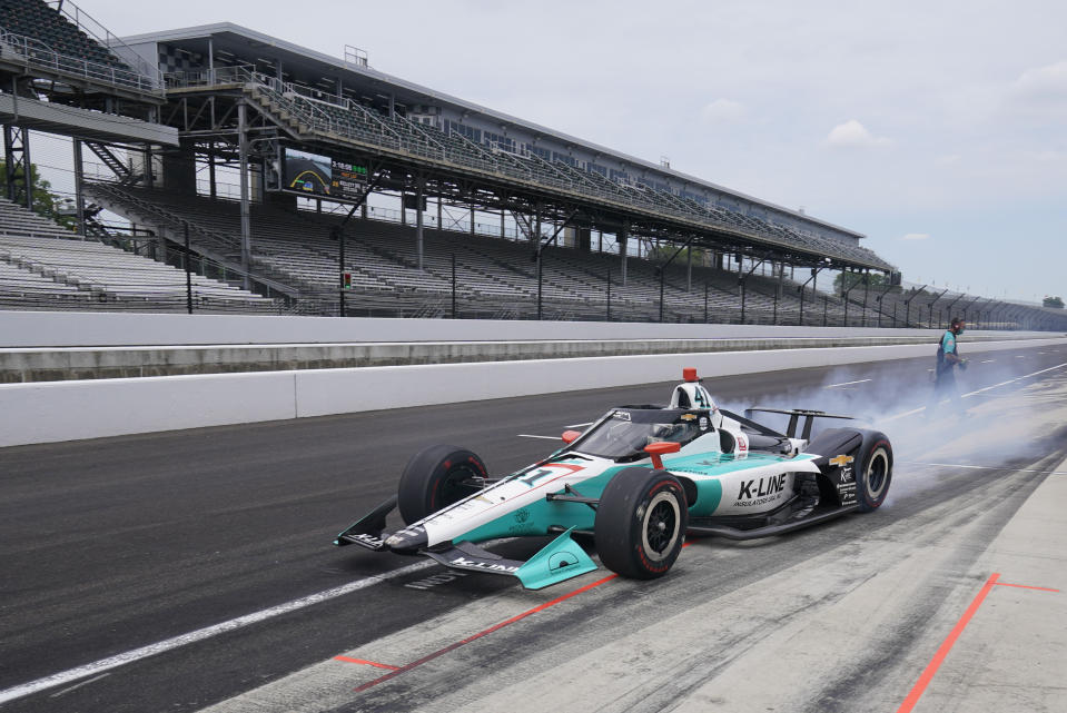 Dalton Kellett pulls out of the pits during a practice session for the Indianapolis 500 auto race at Indianapolis Motor Speedway, Thursday, Aug. 13, 2020, in Indianapolis. (AP Photo/Darron Cummings)