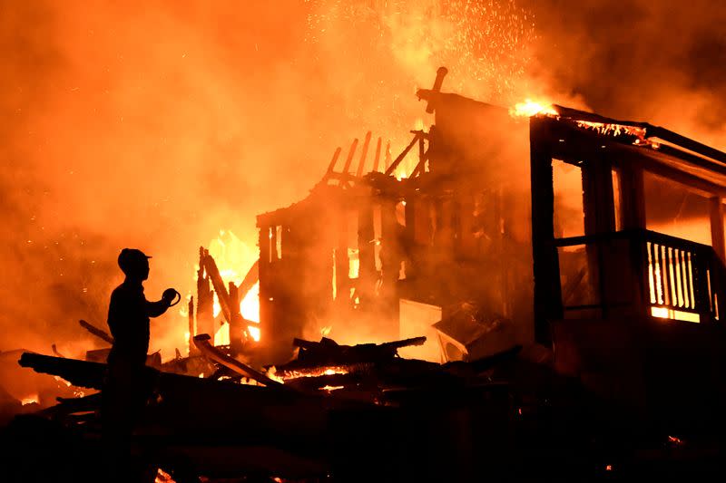 Wildfire in California burns through the night north of Los Angeles