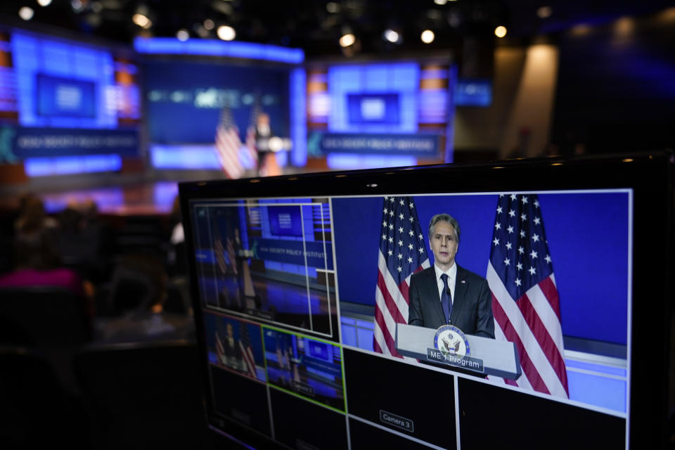 Secretary of State Antony Blinken is seen on a monitor as he speaks at George Washington University in Washington, Thursday, May 26, 2022, outlining the administration's policy toward China at an event hosted by the Asia Society. (AP Photo/ Carolyn Kaster)