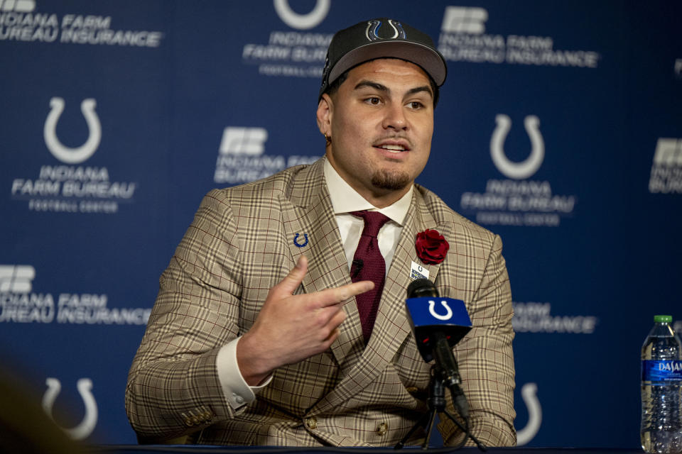 Indianapolis Colts first round draft pick Laiatu Latu speaks at an NFL football news conference in Indianapolis, Friday, April 26, 2024. (AP Photo/Doug McSchooler)