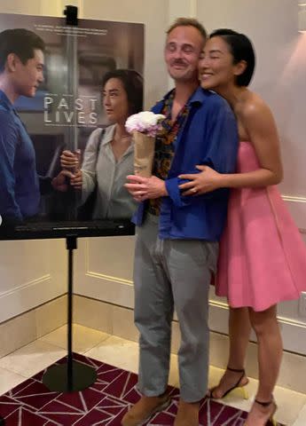 <p>Sharon Lee Clark/Instagram</p> Greta Lee and Russ Armstrong at a screening of Past Lives.