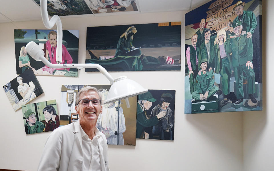 Dr. Scott Jensen, poses in one of his exam rooms that features a MASH television show theme at his Watertown, Minn., clinic, on Sept. 22, 2021. Jensen is a family physician now running for governor. He's become the frontrunner for the GOP nomination on a platform of vaccine skepticism and opposition to the restrictions that Democratic Gov. Tim Walz and President Joe Biden have used to manage the pandemic. AP Photo/Jim Mone)