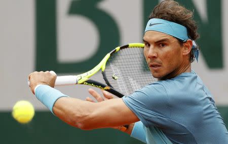 Tennis - French Open - Roland Garros - Rafael Nadal of Spain vs Sam Groth of Australia Paris, France - 24/05/16. Rafael Nadal of Spain returns the ball. REUTERS/Gonzalo Fuentes