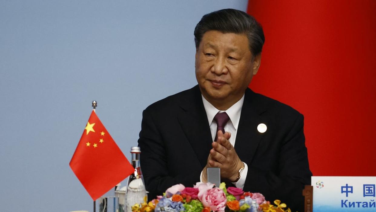 Chinese President Xi Jinping applauds during the joint press conference of the China-Central Asia Summit in Xian, in China's northern Shaanxi province on May 19, 2023.