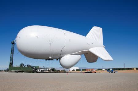 A Raytheon Joint Land Attack Cruise Missile Defense Elevated Netted Sensor System (JLENS) aerostat is pictured on the White Sands Missile Range, New Mexico, in this February 22, 2012 photo file photo. REUTERS/John Hamilton/DVIDS/Handout/Files