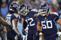 Tennessee Titans running back Derrick Henry (22) celebrates with wide receiver Marcus Johnson (88) after Henry scored a touchdown against the Buffalo Bills in the second half of an NFL football game Monday, Oct. 18, 2021, in Nashville, Tenn. (AP Photo/Wade Payne)