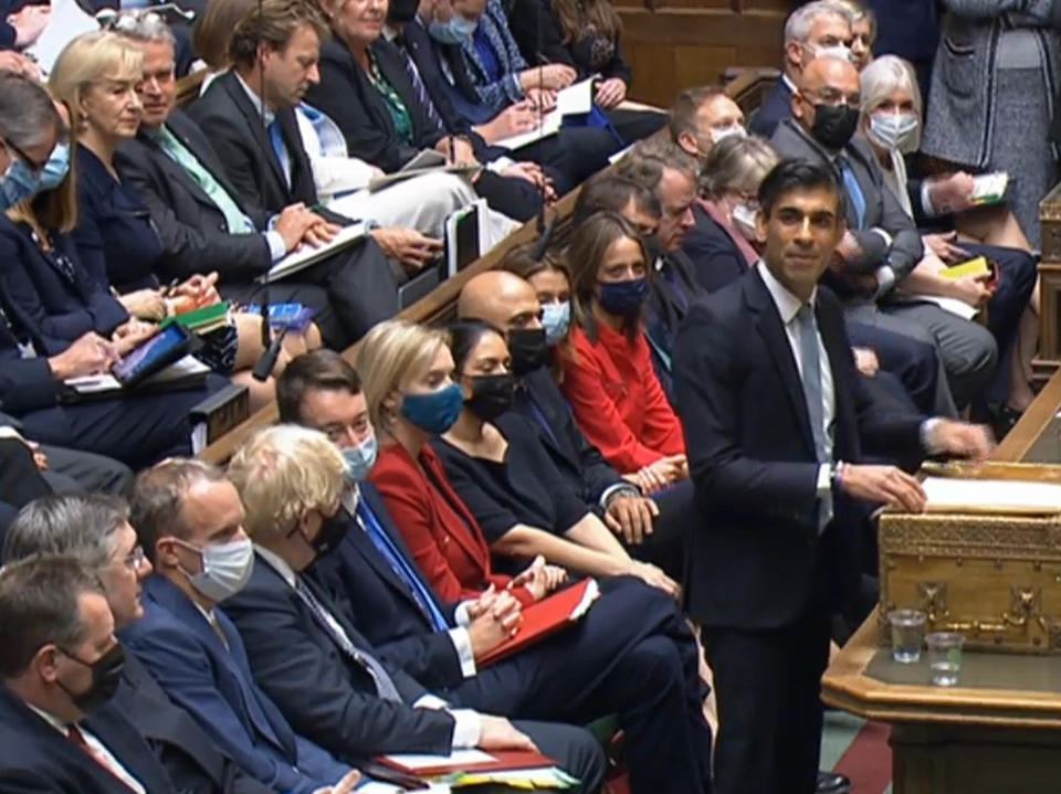 Most of the Conservative front bench, including the PM, justice secretary and foreign secretary, are wearing face masks during the Budget speech (PA)