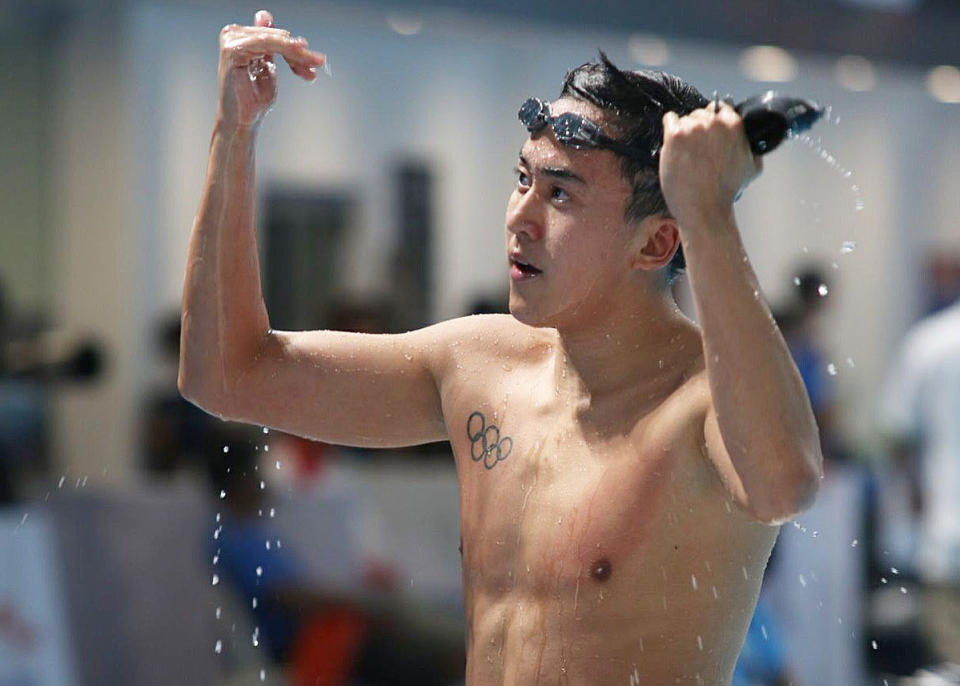 Singapore’s Quah Zheng Wen reacts after winning the 100m backstroke at the National Aquatics Centre in Bukit Jalil on Thursday (24 August). (PHOTO: Hannah Teoh / Yahoo News Singapore)