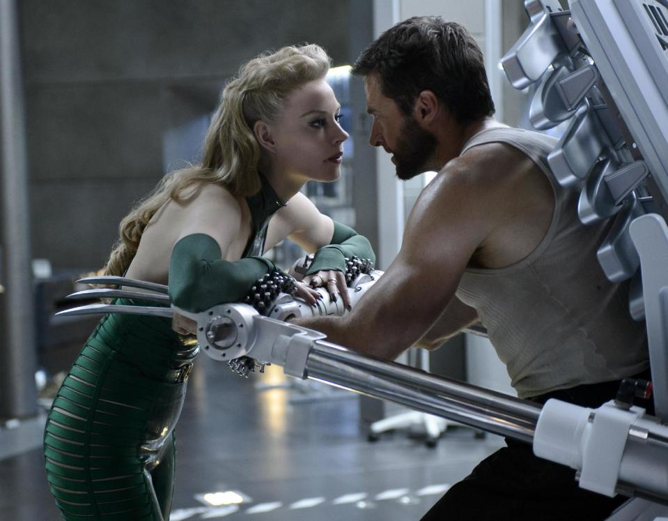 This publicity image released by 20th Century Fox shows Svetlana Khodchenkova as Viper, left, and Hugh Jackman as Logan in a scene from "The Wolverine." (AP Photo/20th Century Fox, Ben Rothstein)