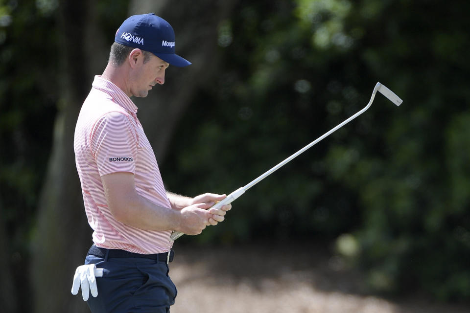 Justin Rose, of England, lines up a putt on the first green during the third round of the Arnold Palmer Invitational golf tournament Saturday, March 9, 2019, in Orlando, Fla. (AP Photo/Phelan M. Ebenhack)