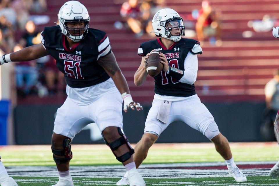 NMSU quarterback Diego Pavia throws a pass during an Aggie football game on Saturday, August 25, 2023, at the Aggie Memorial Stadium.