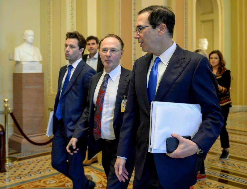 Treasury Secretary Steve Mnuchin heads to a meeting with Senate Minority Leader Chuck Schumer (D-NY) to wrap up work on coronavirus economic aid legislation after meeting with Senate Republicans