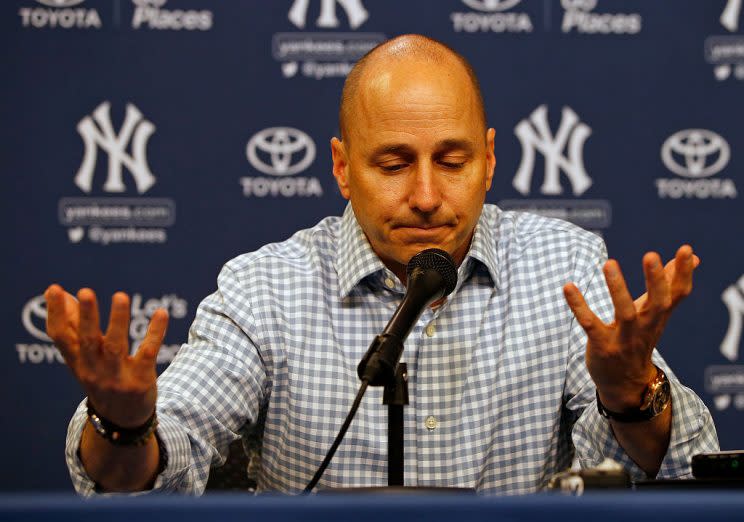 NEW YORK, NY - AUGUST 01: Brian Cashman, general manager of the New York Yankees, talks during a press conference before a game against the New York Mets at Citi Field on August 1, 2016 in the Flushing neighborhood of the Queens borough of New York City. (Photo by Rich Schultz/Getty Images)