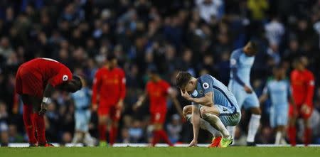 Britain Soccer Football - Manchester City v Liverpool - Premier League - Etihad Stadium - 19/3/17 Manchester City's John Stones looks dejected Action Images via Reuters / Jason Cairnduff Livepic