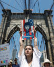 <p>Demonstrators cross the Brooklyn Bridge carrying signs during “Keep Families Together” march to protest Trump administration’s immigration policy in New York, June 30, 2018. (Photo: Shannon Stapleton/Reuters) </p>