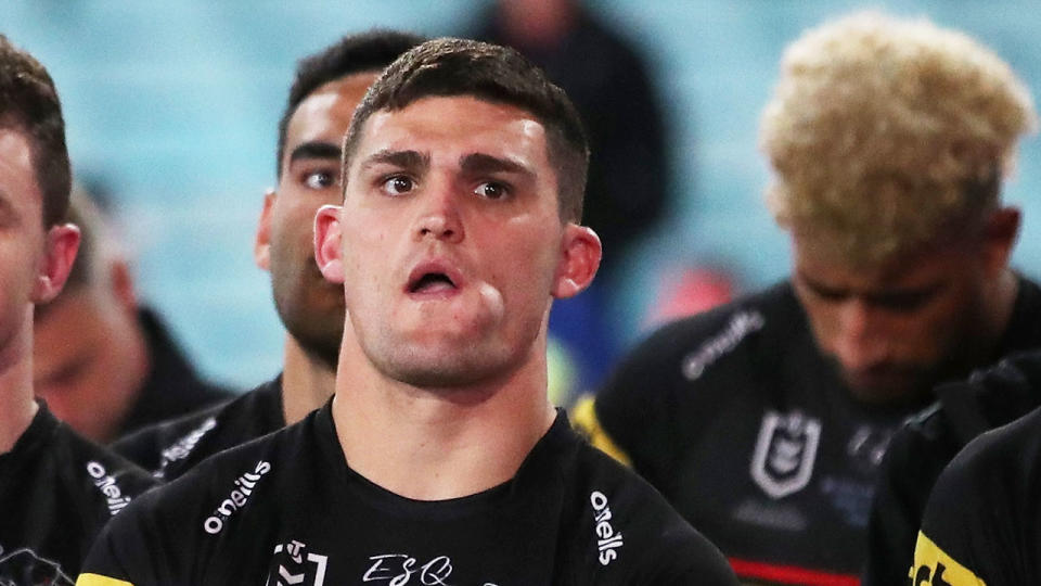 Pictured here, Nathan Cleary looks dejected after his Penrith side lose the grand final to Melbourne.