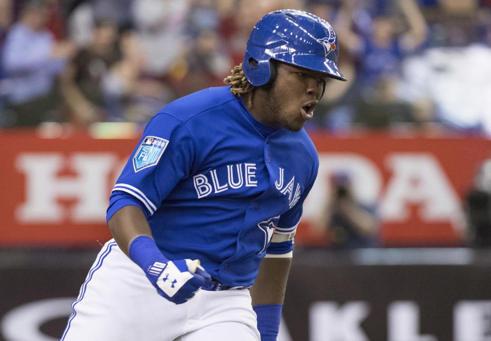 Toronto Blue Jays’ Vladimir Guerrero Jr. celebrates his home run against the St. Louis Cardinals during the ninth inning of a baseball exhibition game Tuesday, March 27, 2018, in Montreal. (AP)