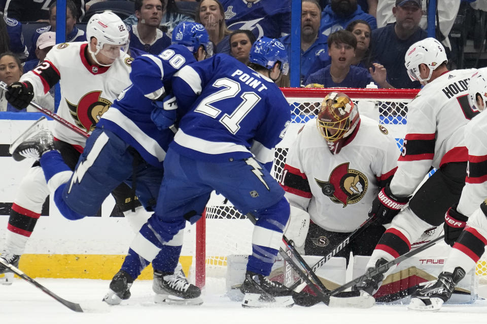 Ottawa Senators goaltender Anton Forsberg (31) makes a save on a shot by Tampa Bay Lightning center Brayden Point (21) during the first period of an NHL hockey game Tuesday, Nov. 1, 2022, in Tampa, Fla. (AP Photo/Chris O'Meara)