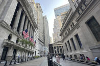 The New York Stock Exchange, left, is shown on Wednesday, July 10, 2024, in New York. Shares have opened higher in Europe after most markets in Asia declined, although Tokyo's Nikkei 225 index closed at another record high (AP Photo/Peter Morgan)