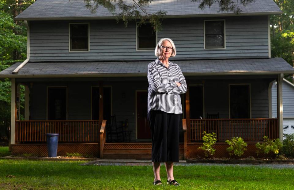 Janet Rupert poses outside her home in Chapel Hill, N.C., Wednesday, June 12, 2024.