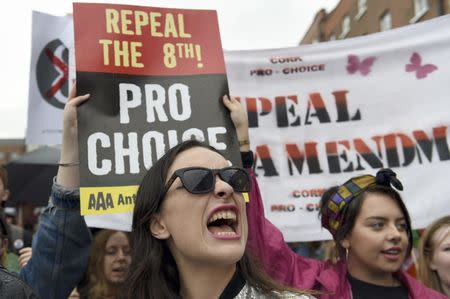 Demonstrators take part in a protest to urge the Irish Government to repeal the 8th amendment to the constitution, which enforces strict limitations to a woman's right to an abortion, in Dublin, Ireland September 24, 2016. REUTERS/Clodagh Kilcoyne