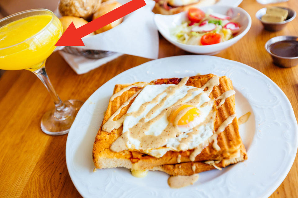 Brunch with croque madame and mimosa cocktail