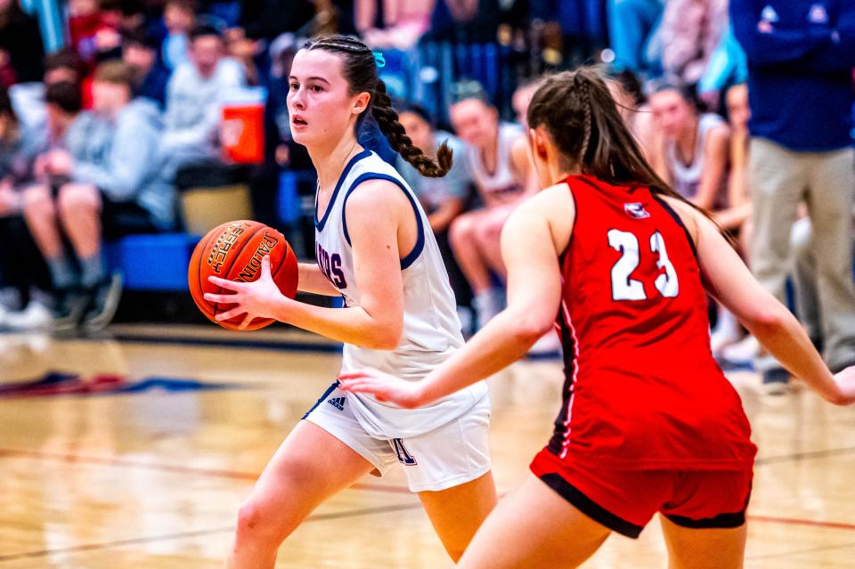 Apponequet's Cecelia Levrault looks to move the ball around the court.