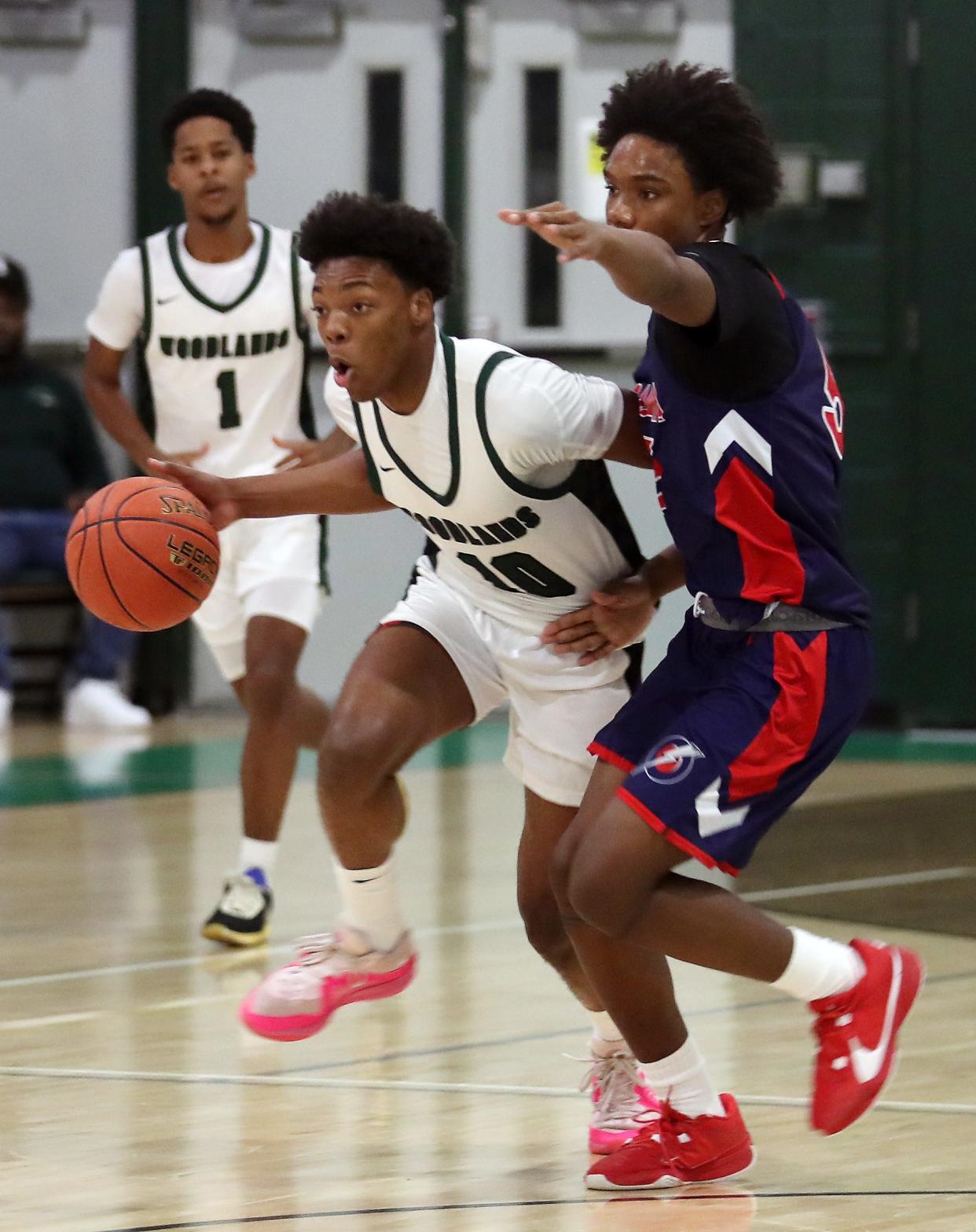 Woodlands’s Eric Woodberry (10) drives to the basket in front of Obama’s Dontaye Dunkle (5) during the inaugural Lower Hudson Valley My Brothers Keeper Basketball Showcase at Woodlands High School in Greenburgh Jan. 10, 2024. Woodlands won the game 56-45.
