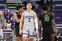 Northwestern guard Ty Berry (3) reacts after a missed a basket during the second half of an NCAA college basketball game against Chicago State in Evanston, Ill., Wednesday, Dec. 13, 2023. Chicago State won 75-73. (AP Photo/Nam Y. Huh)