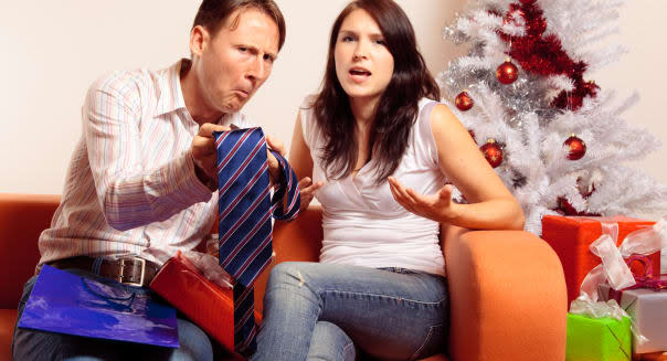 young couple exchanging christmas gifts (series)