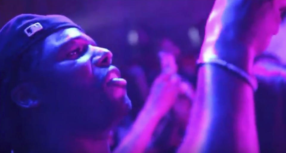 This image taking from video provided by Raheem McCaskill/16ShotEm Visualz shows Zachary Stoner at the Refuge music club in Chicago on May 29, 2018. Chicago police documents obtained by The Associated Press show investigators believe they solved the 2018 killing of a gangland journalist known as “ZackTV” but that prosecutors declined to prosecute. Police never announced arrests in the downtown shooting of Zachary Stoner.(Raheem McCaskill/16ShotEm Visualz via AP)