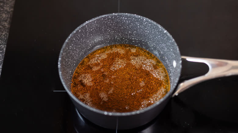 caramel bubbling in saucepan 