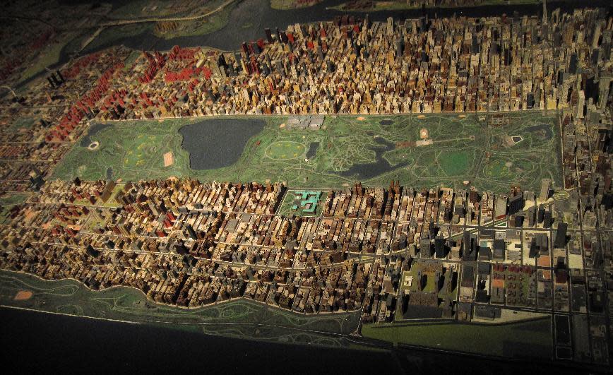 This April 9, 2014 photo shows a section of the "Panorama of the City of New York," a scale model of the city on display at the Queens Museum of Art in Flushing Meadows Park in Corona in the Queens borough of New York. The panorama debuted at the 1964 World's Fair, which was held 50 years ago in Queens, and it's one of a number of artifacts and landmarks that visitors can see as the fair's golden anniversary is observed. (AP Photo/Beth J. Harpaz)