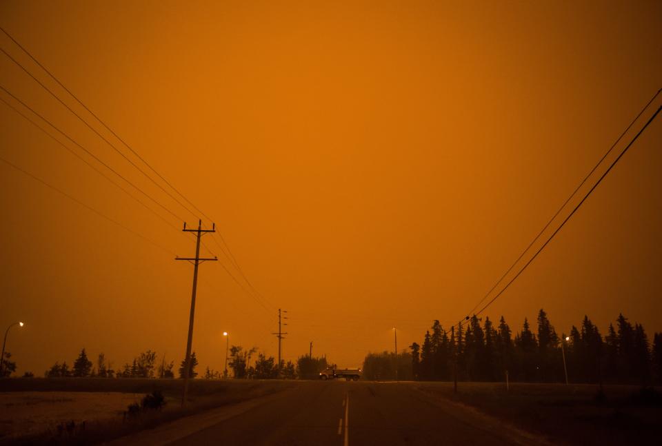 PHOTOS: B.C. wildfires choke western Canada in smoke